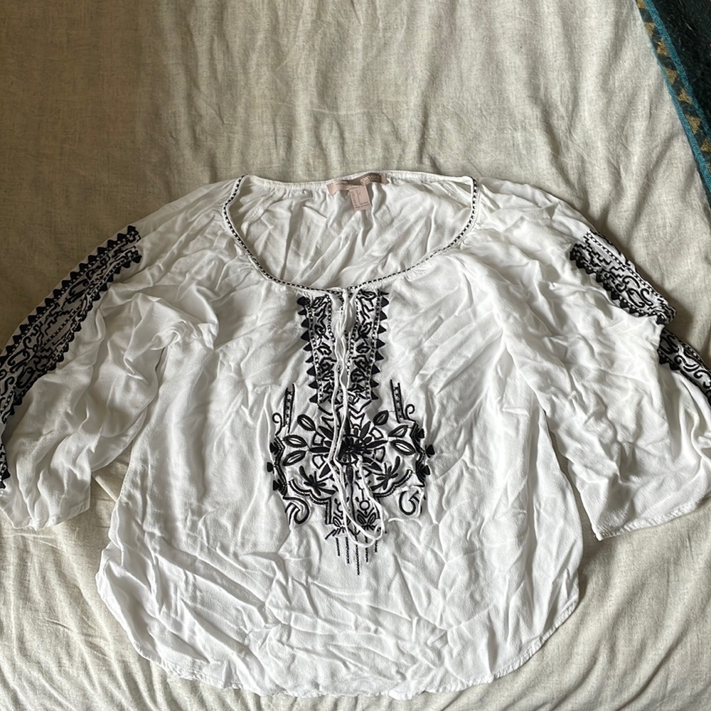 Size small white flowy shirt with black threaded designs by Forever 21